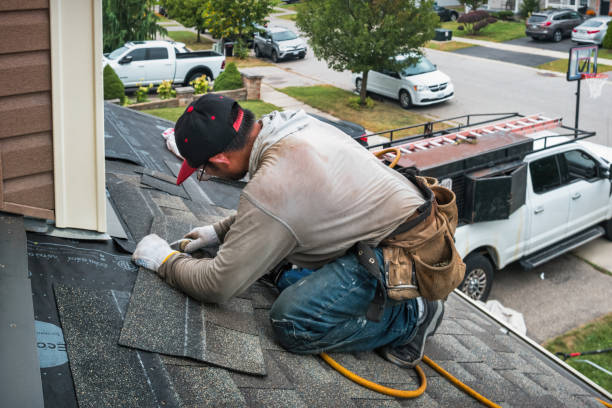 Professional Emergency Roof Repair technician working in Clinton, MS